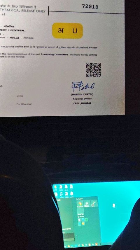 Man Works on Laptop While Watching Shah Rukh Khan's Film in Theatre