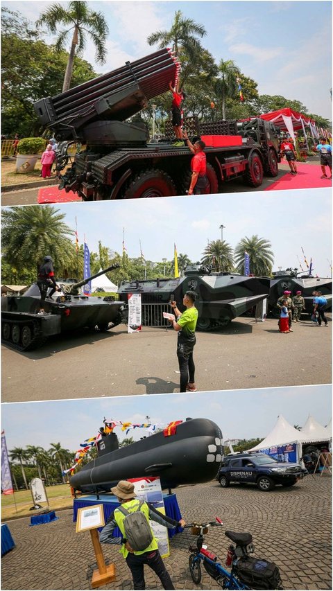 FOTO: Antusiasme Masyarakat Lihat Rudal, Tank Ampibi, Drone Tempur hingga Kapal Selam di Pameran Alutsista TNI di Monas