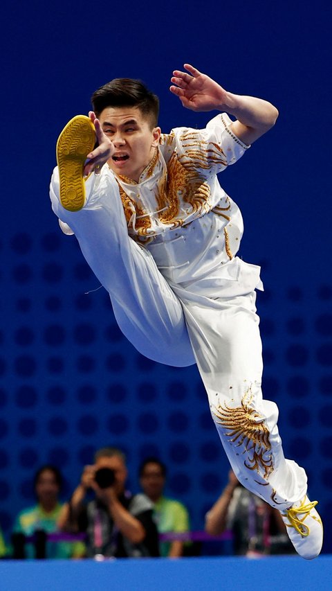 FOTO: Penampilan Memukau Edgar Xavier Marvelo, Atlet Wushu Indonesia yang Sukses Meraih Perak di Asian Games