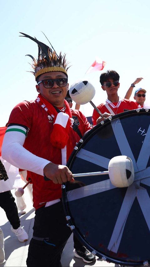 FOTO: Antusiasme Suporter Garuda Jelang Duel Timnas Indonesia vs Jepang di Piala Asia 2023