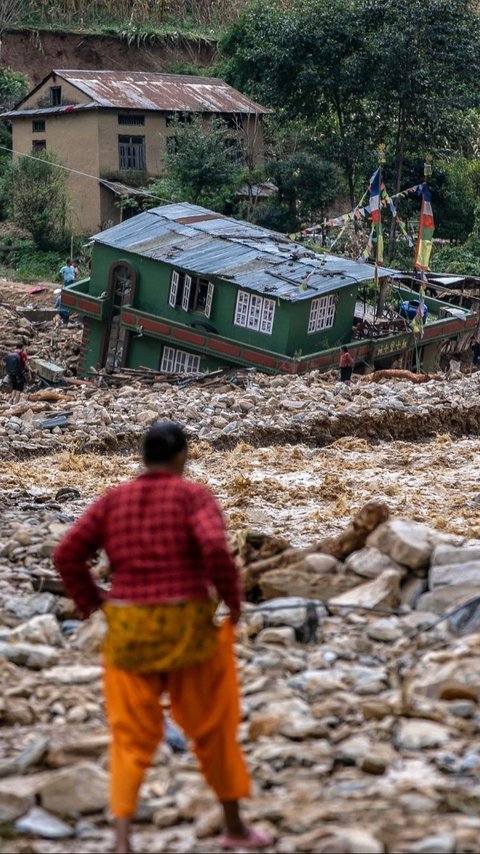 FOTO: Dahsyatnya Amukan Banjir Parah di Nepal, Rumah-Rumah Hanyut hingga 192 Orang Tewas