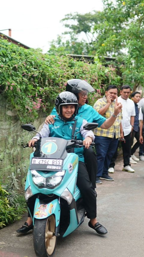 Terjebak Macet, Cawalkot Tangsel Ini Turun dari Mobilnya Bonceng Motor Demi Temui Pendukung