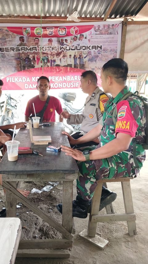 Aksi Bhabinkamtibmas dan Babinsa Bikin Adem Pilkada di Pekanbaru