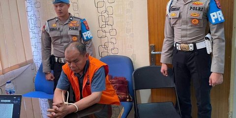 Begini Tampang AKP Dadang Iskandar Usai Tembak Rekan Sendiri, Kepala Menunduk dan Tangan Diborgol