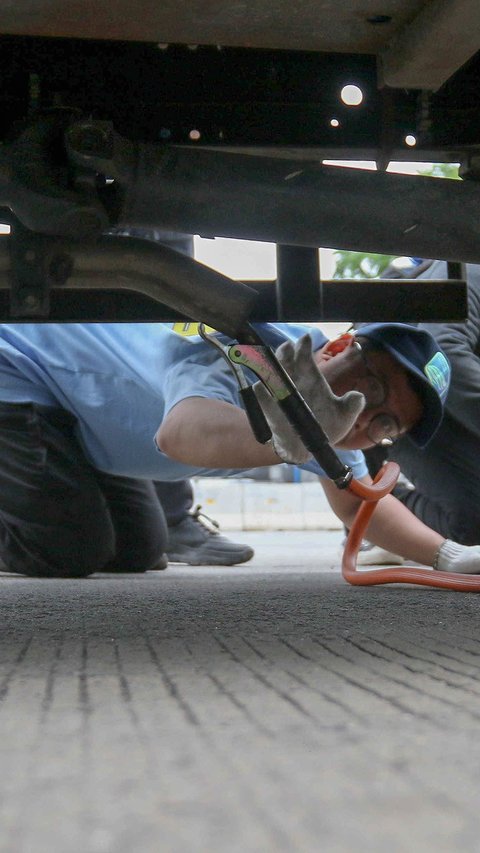 FOTO: Antusiasme Warga Ikut Uji Emisi Gratis