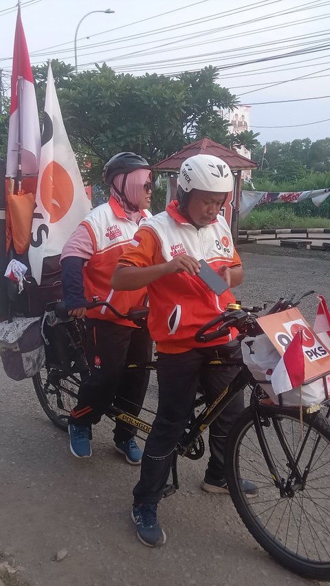 Bersepeda dari Yogyakarta, Pasutri Ini Ajak Masyarakat Hadiri Kampanye Akbar AMIN di JIS