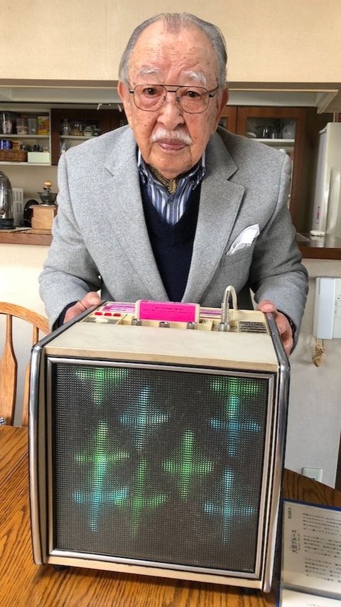 This is the figure of the original inventor of the Karaoke machine who passed away at the age of 100