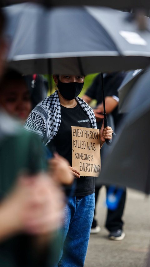 FOTO: Aksi Kamisan ke-808, Aktivis Soroti Kekerasan Terhadap Perempuan