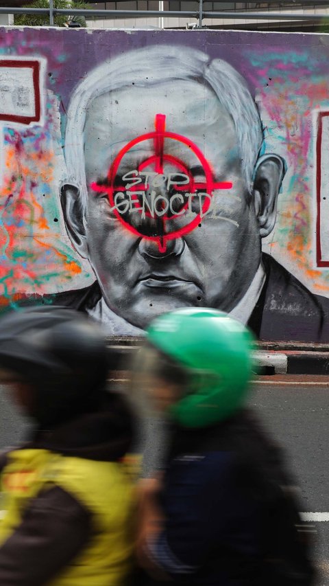 FOTO: Mural Solidaritas untuk Palestina Bermunculan di Kawasan Dukuh Atas, Wajah Benjamin Netanyahu Dibidik