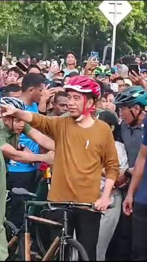 Momen Presiden Jokowi, Iriana hingga Jan Ethes Bersepeda di Bundaran HI
