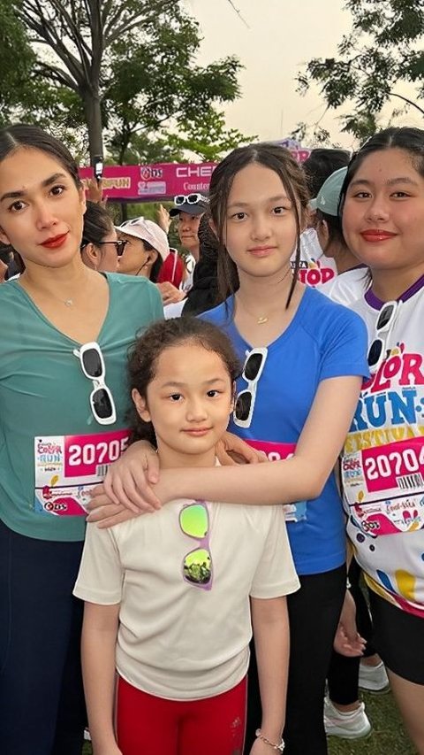 Portrait of Healthy Quality Time of Ussy and Her 4 Daughters, Complete 5K Run and Win First Medal