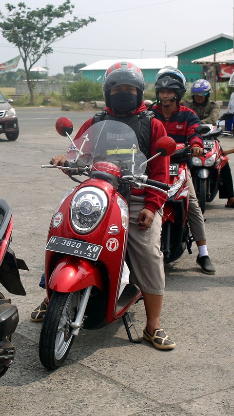 7 Cara Membonceng Anak dengan Aman di atas Sepeda Motor