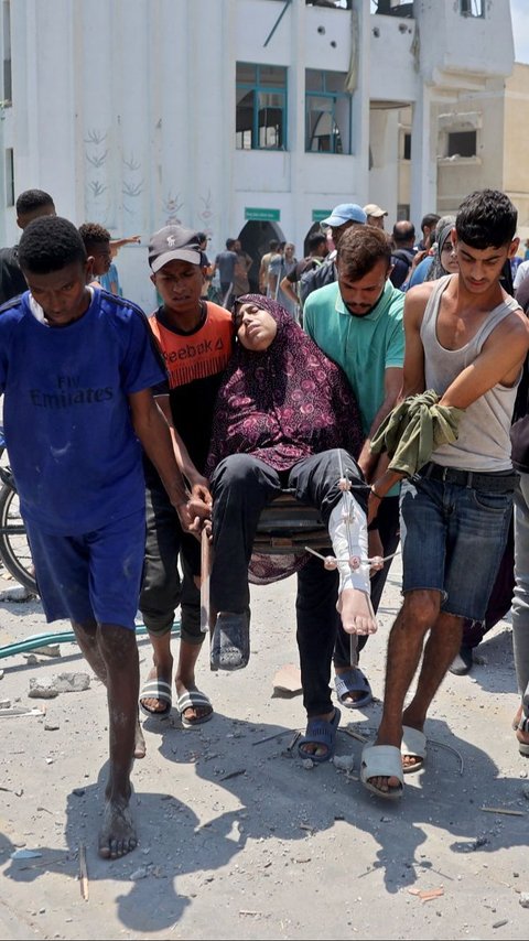 FOTO: Lagi, Israel Gempur Sekolah yang Jadi Kamp Pengungsian di Jalur Gaza hingga Tewaskan 30 Orang