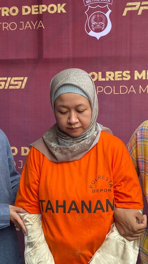 Berbaju Tahanan, Ini Tampang Meita Irianty Tersangka Penganiaya Balita di Daycare Kini Tertunduk