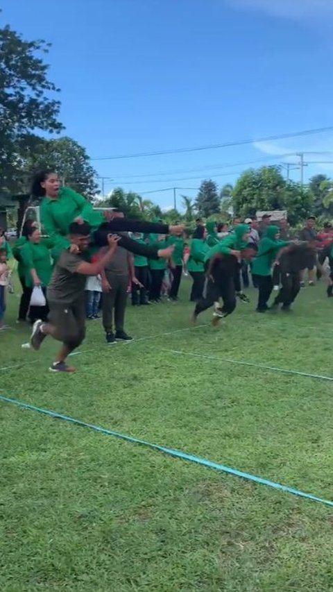 Not Carried, Husband's Action of Carrying Wife During This Running Competition Makes Netizens Laugh