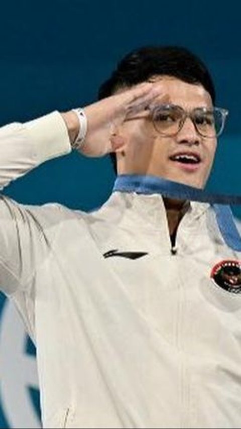 Rizki Juniansyah Berhasil Raih Medali Emas Cabor Angkat Besi dan Catat Rekor Baru di Olimpiade