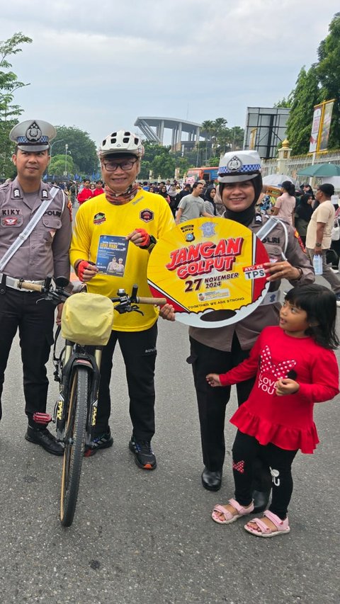 Manfaatkan CFD, Satlantas Pekanbaru Ajak Masyarakat Wujudkan Pilkada Damai