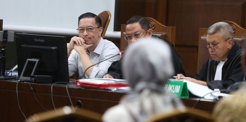 FOTO: Raut Tom Lembong Derngarkan Keterangan Saksi JPU di Sidang Kasus Impor Gula