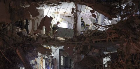 FOTO: Pembalasan Iran, Rudal Balistik Memorakporandakan Kompleks Bangunan di Kota Tel Aviv Israel