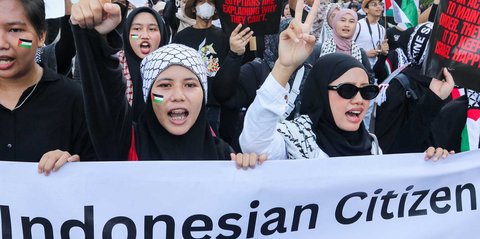 FOTO: Aksi Solidaritas Gerakan Global March to Gaza di Bunderan HI