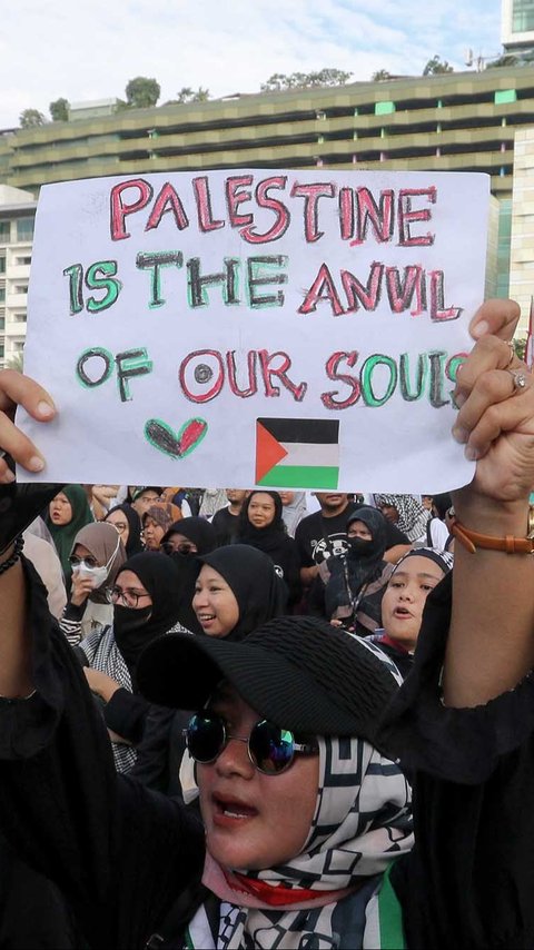 FOTO: Aksi Solidaritas Gerakan Global March to Gaza di Bunderan HI