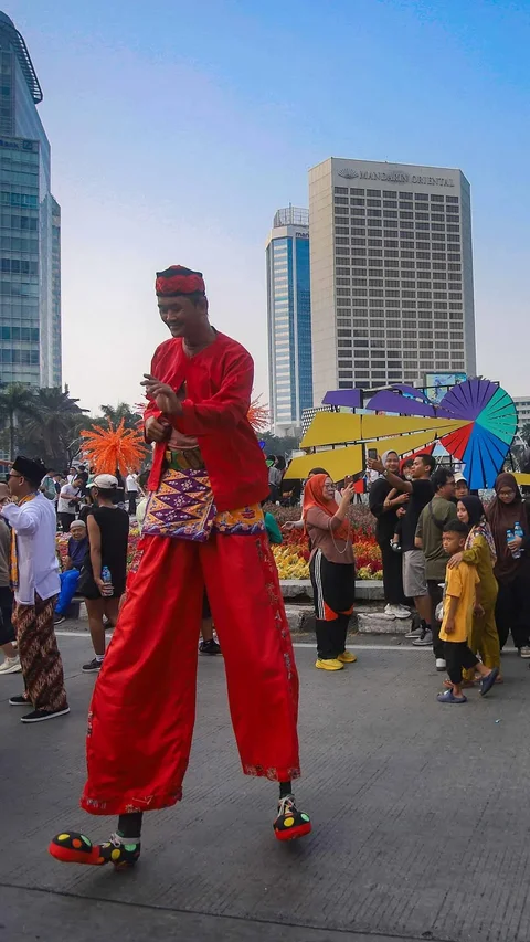 FOTO: Pawai Budaya Betawi Semarakkan HUT ke 499 Jakarta di Bundaran HI