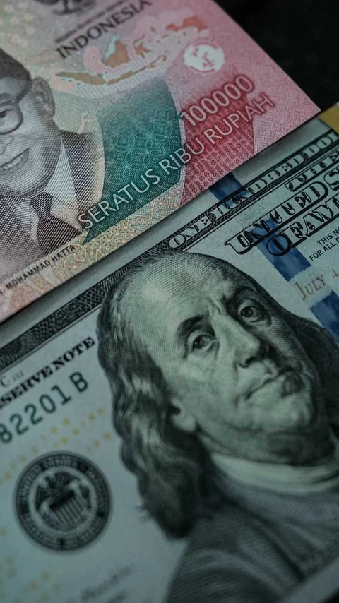 FOTO: Rupiah Tembus Rp 18000 per Dolar AS di Tengah Tekanan Global