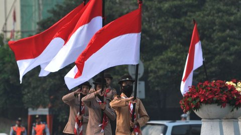 FOTO: Bulan Kebangsaan, Upacara Pengibaran Bendera Merah Putih Menghiasi Bundaran HI