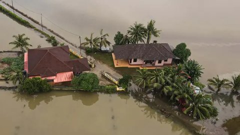 FOTO: Kondisi Banjir Parah Landa Malaysia, Ratusan Ribu Orang Mengungsi