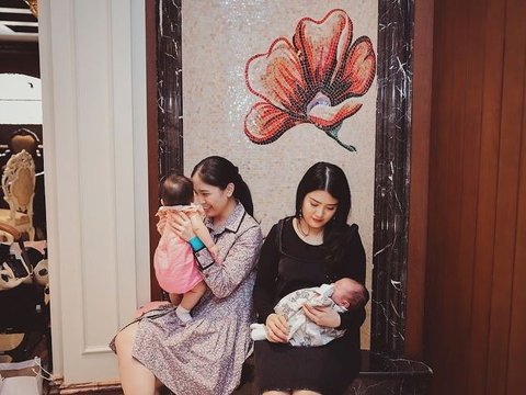 Potret Valencia Tanoe Ajak Baby Avery dalam Liburan Perdana Keluarga Kecilnya, Momen Kevin Sanjaya Gendong Sang Buah Hati Bikin Salfok