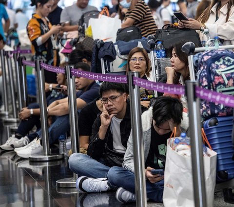 FOTO: Kacau! Bandara di Berbagai Negara Lumpuh Imbas Gangguan Sistem IT Besar-besaran