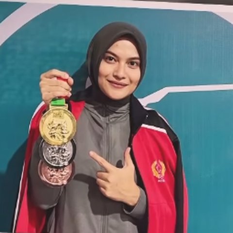 Mengenal Briptu Derli Amalia, Polwan Cantik Jago Menembak 'Borong' Medali di PON XXI