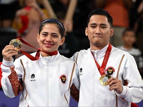 FOTO: Ganda Campuran Hikmat Ramdani dan Leani Ratri Oktila Raih Emas Pertama untuk Indonesia di Paralimpiade Paris 2024