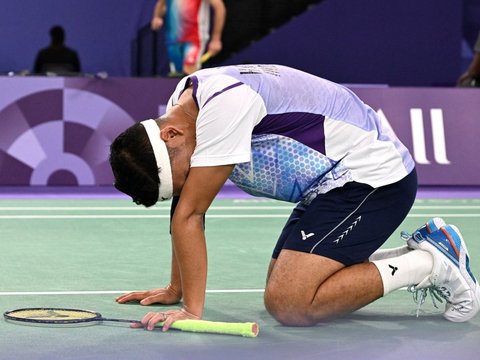 FOTO: Ganda Campuran Hikmat Ramdani dan Leani Ratri Oktila Raih Emas Pertama untuk Indonesia di Paralimpiade Paris 2024