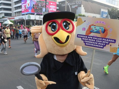 FOTO: Aksi Long March Sosialisasi Pengawasan Pilkada Serentak 2024 dari Kantor Bawaslu ke Bundaran HI