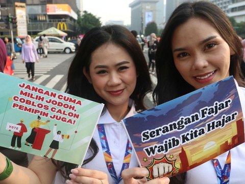 FOTO: Aksi Long March Sosialisasi Pengawasan Pilkada Serentak 2024 dari Kantor Bawaslu ke Bundaran HI