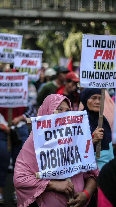 FOTO: Aksi Solidaritas Pekerja Migran Indonesia Padati Kawasan Patung Kuda Tuntut Perlindungan