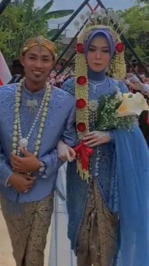 Viral Momen Pernikahan dengan Tradisi Tongkat Pora ala Anggota Pramuka, Curi Perhatian Warganet
