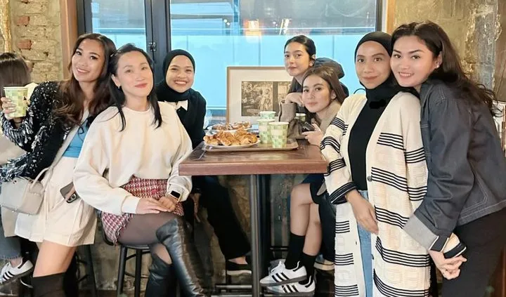 Liburan tanpa mengajak suami dan anak.