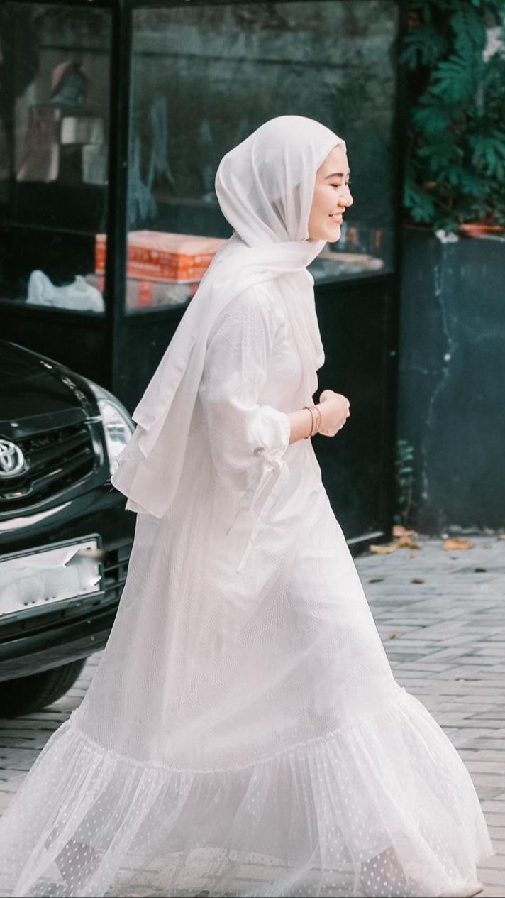 Mengenakan Gamis