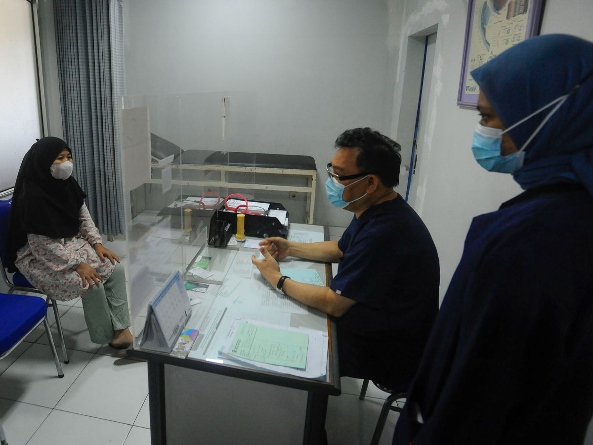 FOTO: Penderita ISPA Meningkat Di Tengah Buruknya Polusi Udara Jakarta