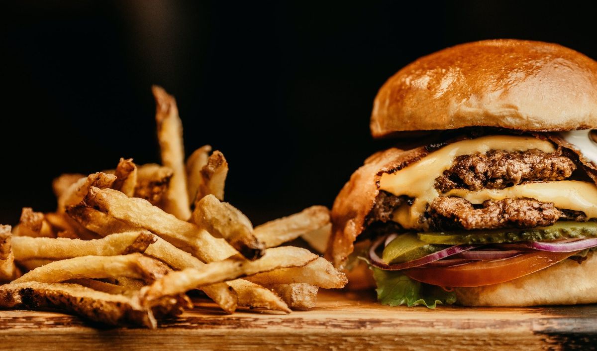 4. Sprinkle a bit more salt and pepper on the top side of the patty.
5. Let the patties cook without disturbing them for about 2-3 minutes or until the edges start to turn crispy and brown. This creates the signature sear that adds flavor and texture to the burger.