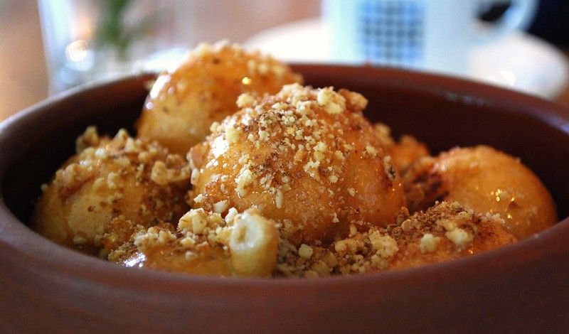 Loukoumades are typically eaten for breakfast or as a snack. They can be enjoyed plain or with a variety of toppings, such as nuts, whipped cream, or chocolate sauce.