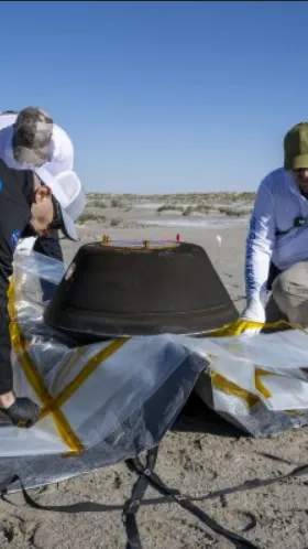 When the recovery team manages to locate the capsule on the ground, they return it to the temporary 