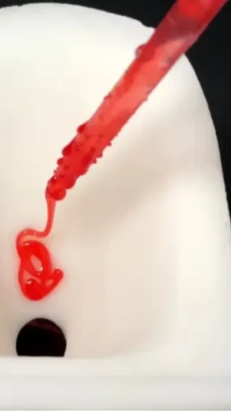 Scientists in China have unveiled an innovative toilet bowl of ultra-slippery material that hardly sticks to anything.