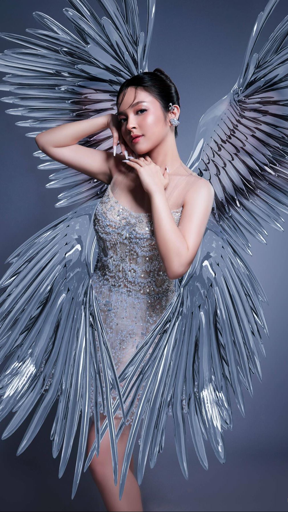 Eca juga sering ikut photoshoot dengan berbagai tema salah satunya 'Angel Wings'