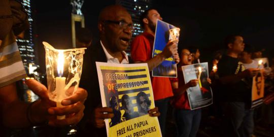 Aksi lilin solidaritas untuk Papua