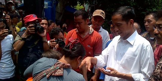Jokowi : Pemegang Jamsostek dan Askes tak berhak miliki KJS