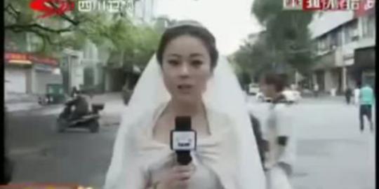 Jurnalis China laporan gempa pakai baju pengantin