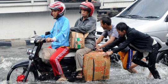 Banjir tak buat Pos Indonesia merugi